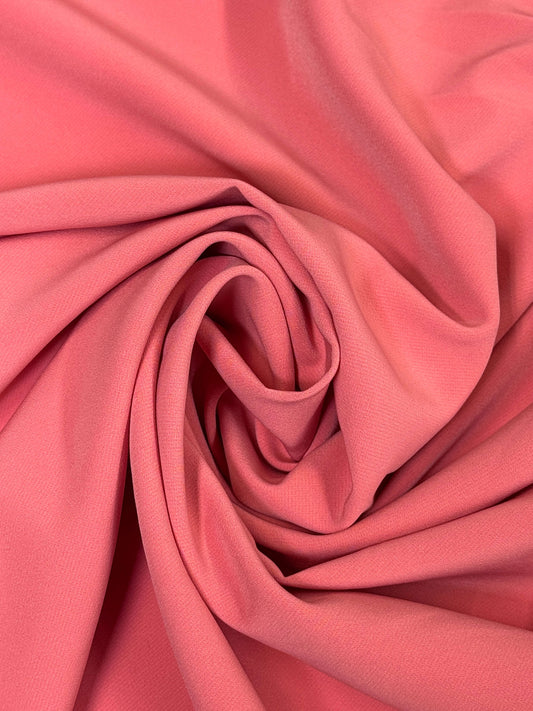 Close-up of pink fabric with folds